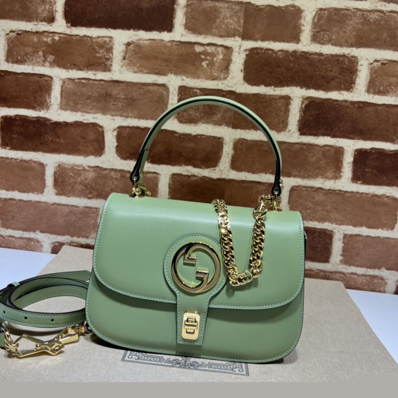G*u*i top handle bags